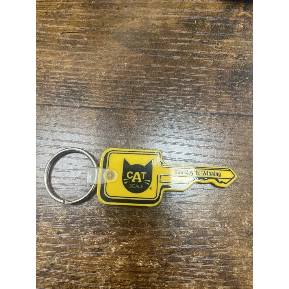 Cat Scale International Trucking Load Weight Logistics Ad Keychain Key to Win